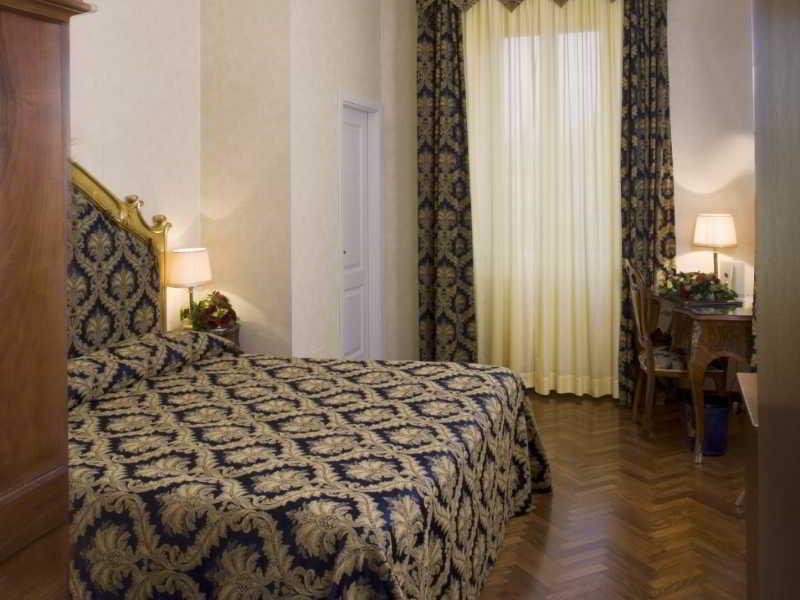 Hotel Vittoria Pesaro Kültér fotó A room at the hotel