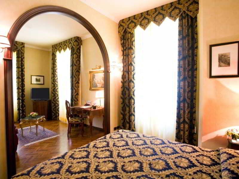 Hotel Vittoria Pesaro Kültér fotó A room at the hotel